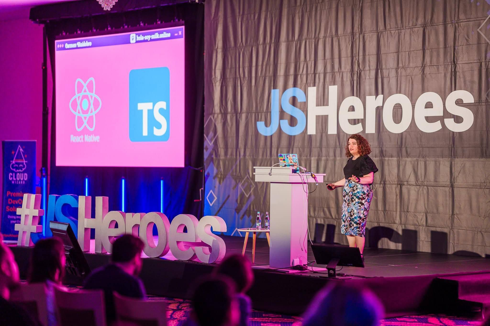 Carmen speaking at a conference